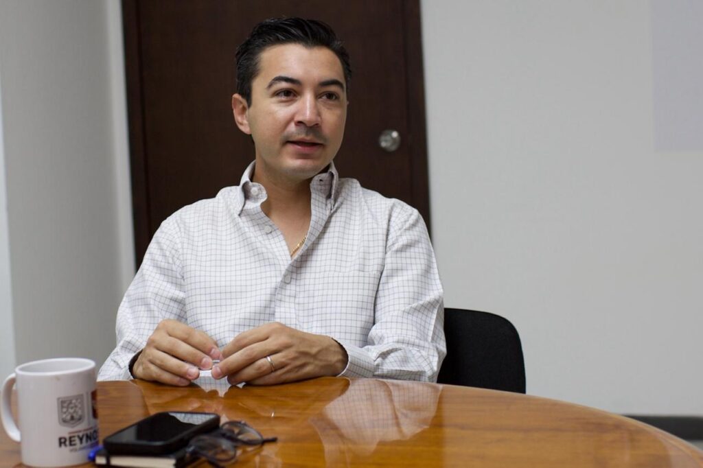 Mauricio Treviño Garza in his office discussing Walmart’s economic impact on Reynosa.