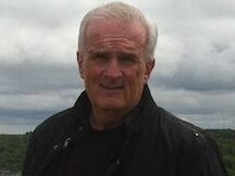 Jim Moore, Chief Operating Officer of the Rio Grande Valley Business Journal, in a black jacket.