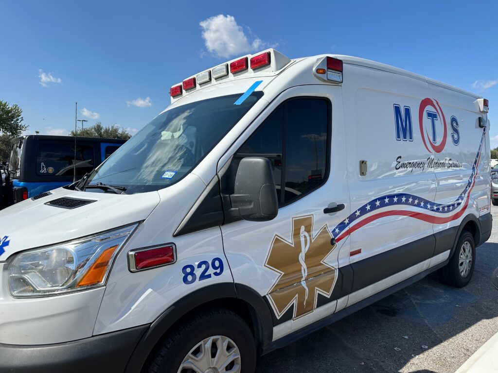 An ambulance waits outside Rio Grande Regional Hospital’s emergency entrance in McAllen as the facility expands its stroke-care capacity. Photo Credit | Kristen Mosbrucker-Garza Alt text: Emergency medical services vehicle parked at Rio Grande Regional Hospital’s emergency entrance in McAllen.