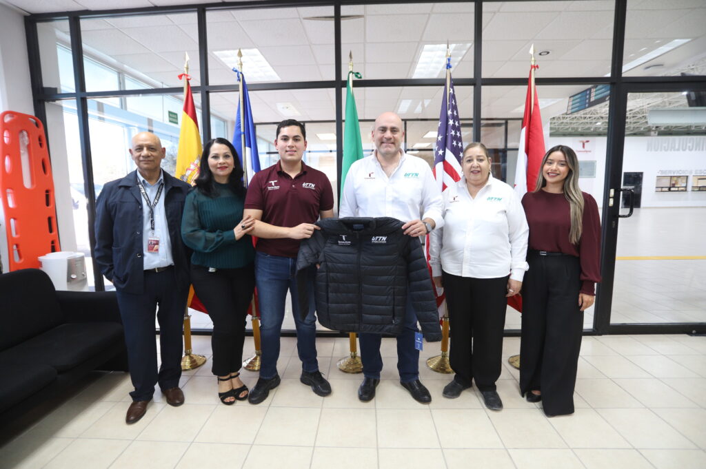 Jesús Sebastián Moreno García with UTTN faculty and staff at a campus event.