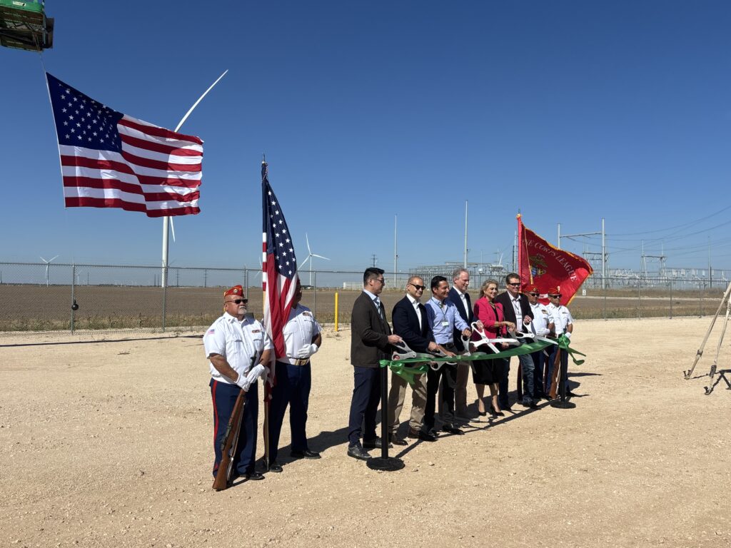 Officials pose for pictures at the Monte Cristo Windpower ribbon-cutting ceremony on Thursday, Nov. 13. 2025, in Edinburg.