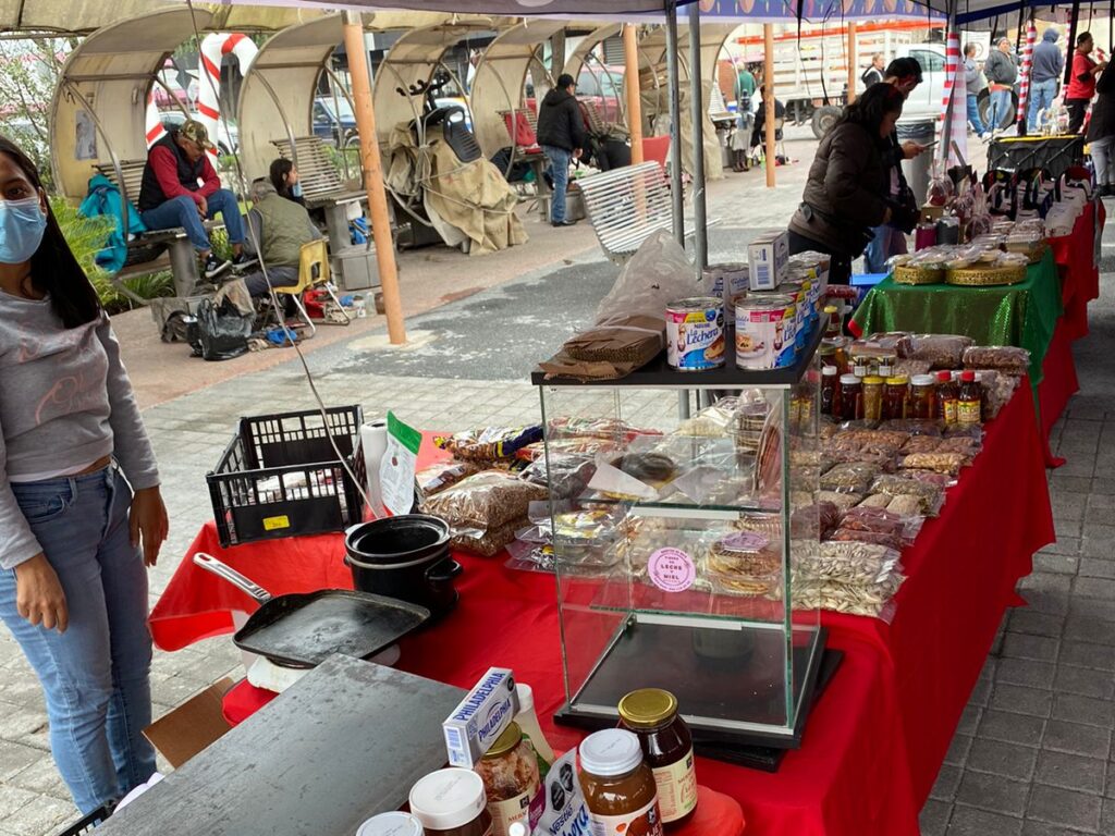 Vendors display handmade goods at outdoor market booths in Reynosa’s main plaza.