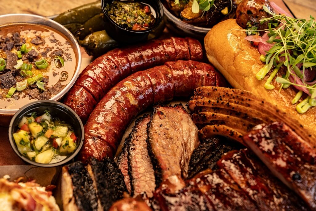 Assorted barbecue meats and sides from GW’s BBQ