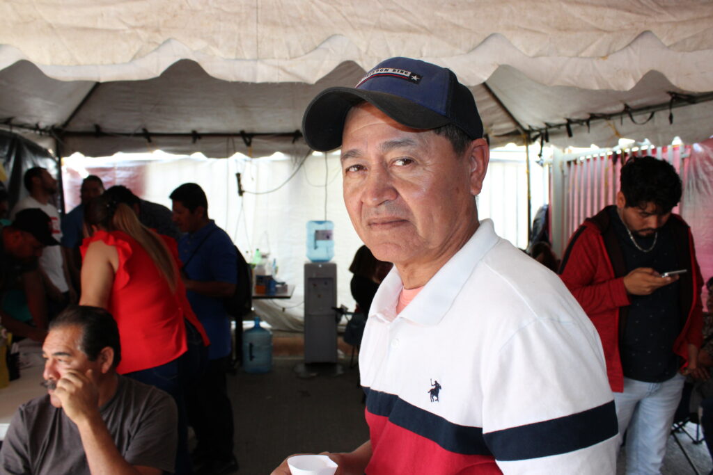 Antonio Rodríguez speaking during a worker assembly about the impact of the Tridonex plant shutdown.