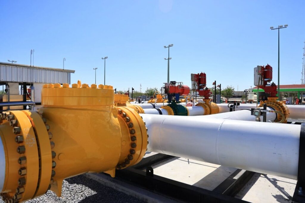 Large natural gas pipeline infrastructure and valves at an energy facility in Reynosa.