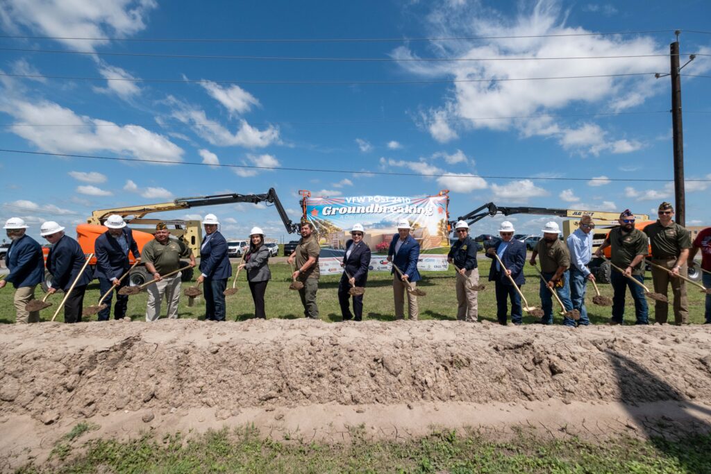 Veterans, elected officials, and community leaders participate in the groundbreaking ceremony for the new VFW Post 2410 building.
