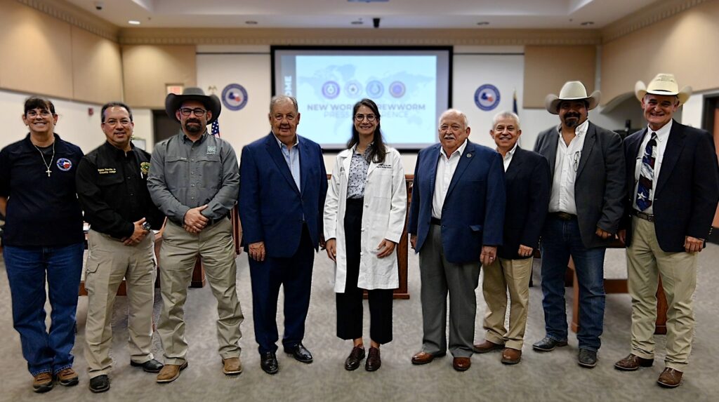 Group photo of Rio Grande Valley officials, veterinarians, and agricultural leaders during a screwworm press conference in Weslaco.