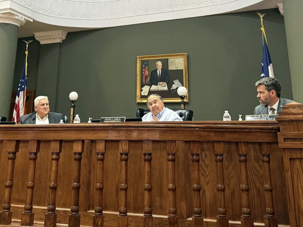 Water expert Sonny Hinojosa, left, sits on a panel with Cameron County Commissioner David A. Garza and Commissioner Gus Ruiz during the Rio Grande Valley Funding Forum in Brownsville.