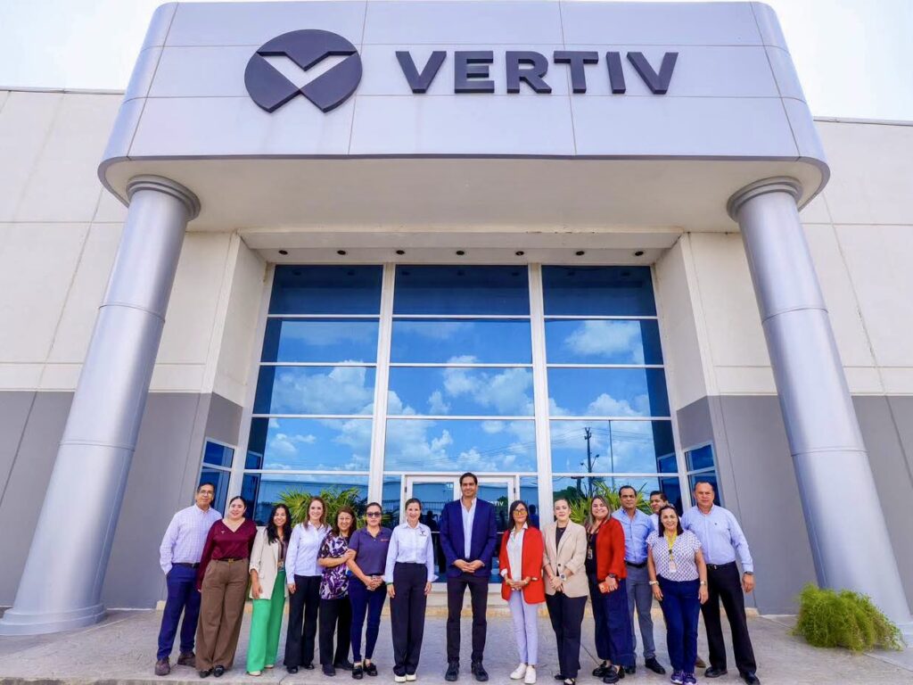 State and municipal officials and Vertiv representatives pose outside the company’s Reynosa facility.