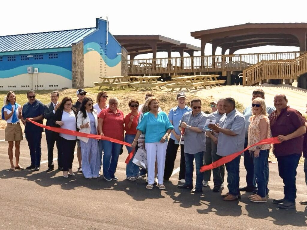 Cameron County officials, project partners and community members cut the ribbon celebrating the completion of the Andy Bowie Park renovation.