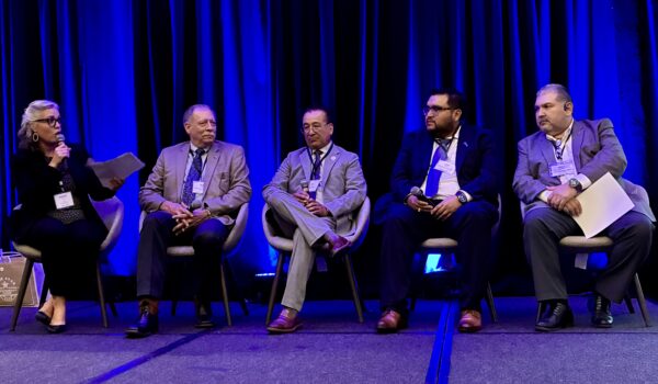 Beverly Loftus moderates an infrastructure panel with Dale Fowler, Javier Martinez, Jerry Briones and Albert Escobedo onstage in Harlingen.