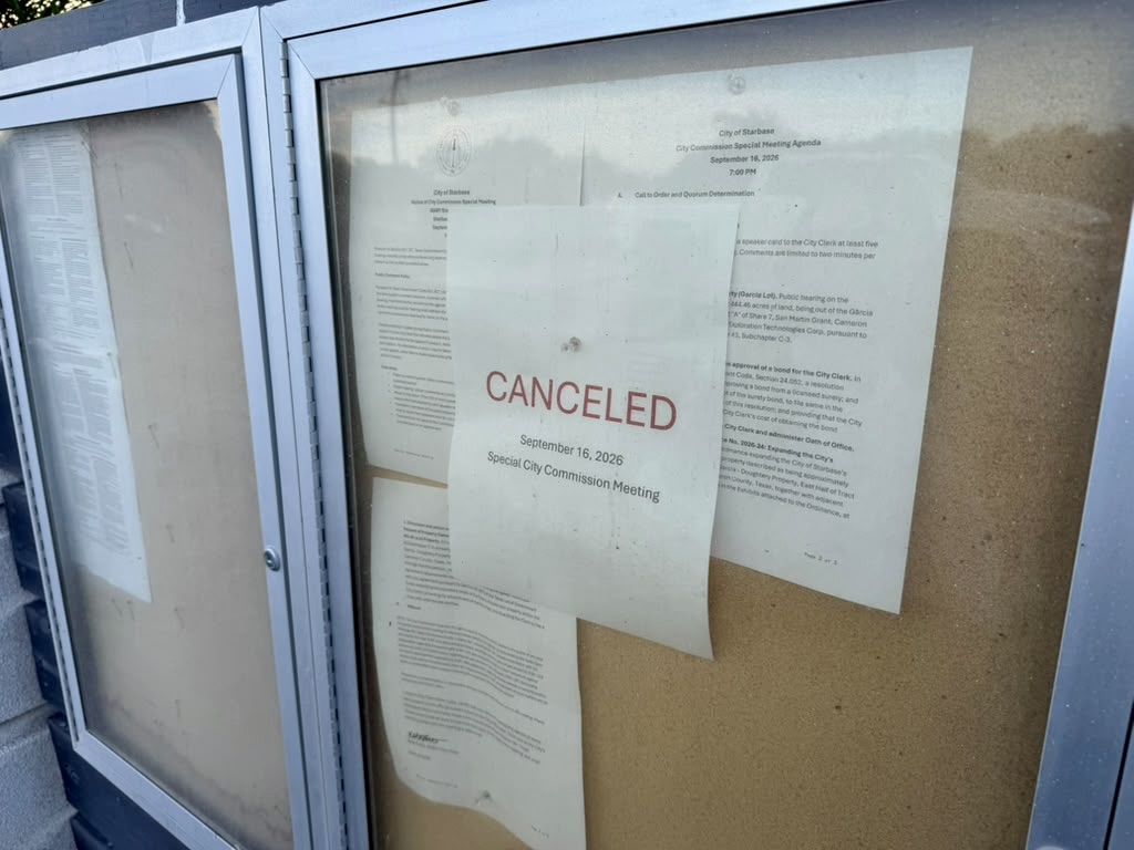 A notice reading “CANCELED” is posted over the Sept. 16 Starbase special City Commission meeting agenda outside City Hall.